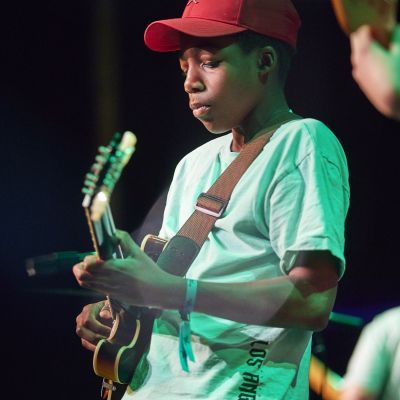 Participant playing instrument during Jazz & Rock course